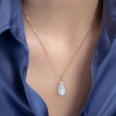 "This necklace features a beautiful large rainbow moonstone neatly suspended from a classic yet strong chain, making this the perfect accessory for those who love larger gemstones. Shimmering color play within the crystal will make this necklace to be a great gift for your beloved one or for Yourself. Matching earrings: https://etsy.me/35sQvVY MATERIALS: * natural rainbow moonstone * accented with tiny moonstones at the chain ends * 14k Gold Filled, 14k Rose Gold Filled, Sterling Silver or 14k S Elegant Moonstone Drop Necklace, Elegant Teardrop Moonstone Necklace, Moonstone Teardrop Pendant Necklace With Gemstone, Moonstone Drop Necklace With Natural Stones, Drop Moonstone Necklace With Natural Stones, Teardrop Moonstone Gemstone Necklace, Moonstone Teardrop Pendant Necklace, Moonstone Gemstone Necklace In Briolette Shape, Moonstone Briolette Gemstone Necklace