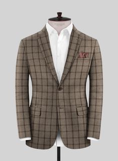 Stay calm and stylish with our Italian Goiti Brown Wool Suit. Crafted from super 120s pure merino wool fabric, the distinguished windowpane check pattern and eye-catching brown color palette make this suit a standout choice. Merino wool fibers are highly breathable and react well to changes in body temperature, ensuring that you stay warm in winter and cool in summer. This classic suit is an instant wardrobe essential that will surely impress on any formal occasion. 
 
 Look features a 2 button Luxury Plaid Tweed Jacket With Welt Pockets, Fitted Brown Tweed Jacket For Business, Fitted Brown Suit, Brown Wool Suits For Workwear, Tailored Brown Wool Suit, Luxury Plaid Wool Tweed Jacket, Elegant Tailored Brown Sport Coat, Brown Single-breasted Suits For Business Casual, Brown Wool Suit For Semi-formal Occasions