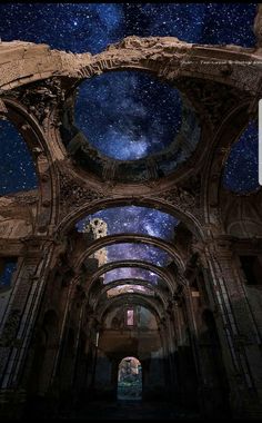 an image of the inside of a building with stars in the sky