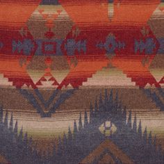 an orange, blue and brown rug with native designs on it's sides that say made in the usa