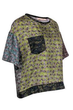 Love to mix and match? This La Prestic Ouiston silk blouse is just the thing! A fun boxy drop shoulder silk blouse with short sleeves and fun green-toned prints. The featured prints mix a repetitive ballerina pattern wearing a cheetah dress accented with camo hem, neckline, and front breast pocket. Style with black mom jeans, fun clogs and an easy crossbody bag for funky yet casual #OOTD. Size S (Le Prestic Ouiston 1) 100% Silk Pull-on Unlined Round neckline Short sleeves Camo hem, neckline, and Green Printed Crew Neck Blouse, Silk Graphic Print Short Sleeve Tops, Silk Short Sleeve Tops With Graphic Print, Silk Summer Tops With Graphic Print, Silk Graphic Print Top For Summer, Silk Top With Graphic Print For Summer, Silk Graphic Print Multicolor Tops, Green Graphic Print Blouse For Spring, Silk Multicolor Graphic Print Tops