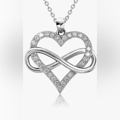 An Original Heart Infinity Necklace To Lift Your Mood And Let You Feel Exceptionally Beautiful. Wear This Sterling Silver Infinity Necklace For Women Alone For Understated, Minimal Elegance Or Layer It With Other Necklaces For A Bold, Contemporary Look. Exquisite Women's Infinity Sign Necklaces A Silver Infinity Symbol Takes Center Stage Within A Cz Diamond Heart Pendant - Encrusted With 28 Sparkling Cubic Zirconia (Cz) Stones. Your Infinite Love Necklace Arrives In A Luxurious Velvet Gift Box. Sterling Silver Infinity Heart Necklace For Anniversary, Silver Infinity Heart Necklace For Anniversary, Elegant Infinity Heart Necklace For Anniversary, Valentine's Day Infinity Cubic Zirconia Jewelry, Valentine's Day Cubic Zirconia Infinity Jewelry, Infinity Necklace Silver, Sterling Silver Heart Necklace, Infinity Heart, Necklace For Girlfriend