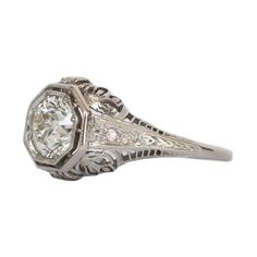 *VIEW A VIDEO OF THIS RING* https://youtu.be/4jrZPS28PDk This ring can be sized up or down 4 sizes for an additional $40. If you wish to have a ring sized please purchase the item and note the size in the message section. Item Details: Ring Size: 6.25 Metal Type: Platinum [Tested and Hallmarked] Weight: 3.5 grams Center Diamond Details GIA Center Diamond - Report # 2205507441 Shape: Old European Brilliant Carat Weight: 1.03 ct Color: J Clarity: SI1 Side Stone Details: Shape: Old European Brillia Antique Gia Certified Diamond Ring, Antique Gia Certified Round Cut Ring, Antique Gia Certified White Gold Diamond Ring, Antique White Gold Gia Certified Diamond Ring, Gia Certified Antique Platinum Diamond Ring, Antique Oval Gia Certified Rings, Antique Gia Certified Diamond Ring Gift, Antique Silver Ring Gia Certified, Antique Diamond Rings With Vvs Clarity