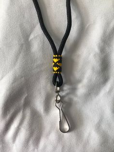 This standard 36" black lanyard has been hand beaded using size 15 glass beads. Every lanyard comes with a plastic badge holder. Black Lanyard, Beaded Lanyard, Beaded Lanyards, Beading Ideas, Native American Beading, Beaded Wraps, Beaded Keychains, Badge Holder, Beaded Necklaces