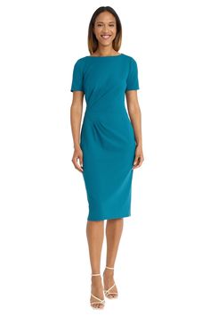 Introducing Bebe, the epitome of sleek sophistication. This form-fitting midi dress features a boat neckline, short sleeves, and subtle side ruching for a flattering silhouette. Perfect for the office, client meetings, or dressed up for evening events. Pair Bebe with pumps and statement earrings for a polished look, or add a blazer for a professional ensemble that commands attention. Missy Dresses, Bearded Lady, Short Sleeve Shift Dress, Daytime Dresses, Maggy London, Boat Neckline, Office Outfits, Polished Look, Sheath Dress