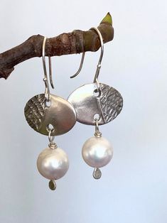 Pearl and Sterling Silver Dangle Earrings. Sterling Silver - Etsy Silver Oval Pearl Drop Earrings, White Hammered Dangle Earrings, Handmade Silver Oval Pearl Earrings, Sterling Silver Dangle Earrings, Light Weight Earrings, Silver Earrings Dangle, Fine Silver, Dangle Drop Earrings, Dangle Earrings