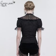 A gothic ruched sleeves top. It features a high neckline, a ribbon panel on the front and short ruched sleeves. The neckline is beaded and the sleeves are bordered with feathered lace. Product specifications: Style: GothicMaterial: Polyester 95%, Spandex 5% Fitted Gothic Blouse For Alternative Fashion, Black Ruffled Top For Alternative Fashion, Gothic Fitted Short Sleeve Top, Fitted Gothic Short Sleeve Tops, Black Gothic Short Sleeve Blouse, Gothic Ruffled Tops For Halloween, Gothic Halloween Tops With Ruffles, Fitted Short Sleeve Gothic Blouse, Halloween Party Top With Ruffles