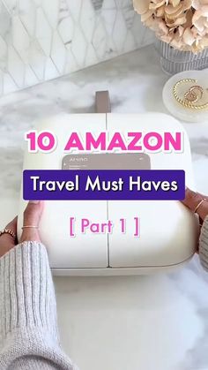 a person holding an amazon travel must haves bag in their hand, with the words 10 amazon travel must haves on it