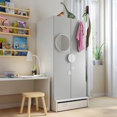 a child's room with toys and books on the shelves, including a toy dinosaur