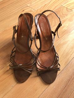 "Description  * Brown leather Animal print sandals by Nino Pandolfi * Leather sole * Made in Italy Material All leather except insole Condition Excellent vintage condition.  Heel taps need to be replaced however due to age (see photo). Size 8 Measurements Insole: 9.75\"/24.7 cm Heel height: 3.75\"/9.5 cm  Label History No information available   On Instagram? Follow me for updates on the latest vintage additions https://www.instagram.com/smokeypearlvintage/ All vintage garments will show general signs of wear consistent with its age and use." Bass Sandals, Animal Print Sandals, Sandals Vintage, Vintage High Heels, Heel Taps, Heel Tap, Handmade Sandals, Best Purses, Stylish Sandals