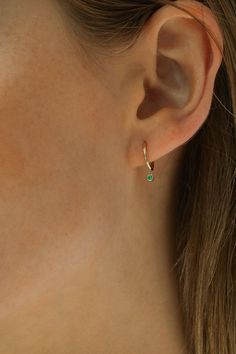 Our beautiful solid 14k gold earrings are a stunning addition to your jewelry collection, crafted with solid 14k gold hoops and stunning emeralds. Perfect for layering. forever piece modern dainty ✨ships the next day ✨ Details: Material: 14k solid gold hoops with emerald Hoop dimensions: outer diameter 10mm, inner diameter 8mm total length 14mm Post thickness: 0.7mm Emeralds: 1.8mm Hypoallergenic Handmade item Ships from a small business Cute Dainty Earrings, Green 14k Gold Hoop Earrings, Minimalist Yellow Gold Hoop Earrings With Gemstone, Everyday Yellow Gold Huggie Earrings With Birthstone, Minimalist Yellow Gold Earrings For May Birthstone, Minimalist Yellow Gold May Birthstone Earrings, 14k Gold Birthstone Huggie Earrings As Gift, Minimalist 14k Gold May Birthstone Earrings, Everyday 14k Gold Hoop Earrings With Gemstones