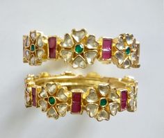 *This is Sterling Silver 22k Gold Plated Kundan Bangles.Its perfect for Wedding Occasion as well as Unique and Ethnic Traditional Bangle to gift and Also Bridal wear to match with Wedding Outfits. *Its 925 silver with handcut kundan stone settings and 100% Handmade screwed bangles pair. *Its Beautifully Multi color pink n green Like shown in picture. *Its available in 2.4 size only for now other sizes will be made to order. *Its open able Screwed Bangles Pair. *All Kundan stones set with silver Punjabi Wedding Jewelry, Indian Wedding Bangles, Indian Kundan Jewellery, Bracelets Indian, Wedding Bangles, Flexible Bracelet, Kundan Bangles, Wedding Bride Jewelry, Wedding Bracelets