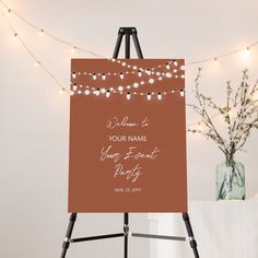 an easel with a sign that says, welcome to your name and year - end party