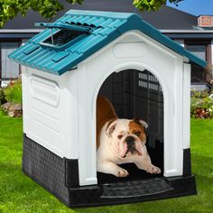 a dog is laying down in his kennel with the roof open and it's head sticking out