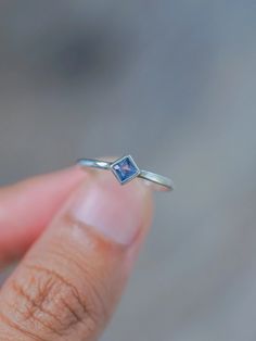 Simple, but not quite ordinary. Subtle, but not quite average. Here's a square sapphire ring to harness clear thoughts and focus in your day-to-day life. Each piece of our jewelry is handcrafted with love. Blue Square Cut Sapphire Promise Ring, Rectangular Sapphire Promise Ring In Sterling Silver, Square Cut Blue Sapphire Promise Ring, Square Cut Sapphire Promise Ring, Sterling Silver Square Cut Sapphire Promise Ring, Square Cut Sapphire Ring For Gift, Square Cut Sapphire Ring As Gift, Square Cut Sapphire Ring In Sterling Silver For Promise, Square Cut Sapphire Promise Ring In Sterling Silver