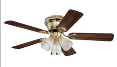 a ceiling fan with three wooden blades and two light shades on the top of it