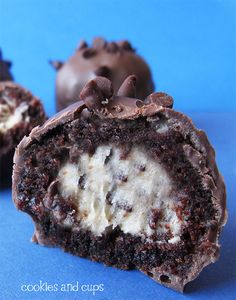 three chocolate cookies and cupcakes are on a blue background with the words cookie dough stuffed brownie truffles