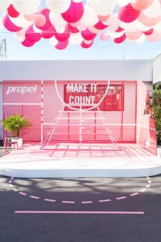 the entrance to make it count with pink and white balloons