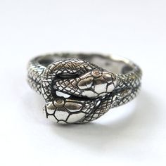 Silver Twin Snake Infinity Ring in Solid White Bronze by mrd74, $39.00 (I am probably a weirdo but I think this would be an adorable gift to a bf/gf) Adjustable Symbolic Snake-shaped Jewelry, Sterling Silver Snake-shaped Rings, Symbolic Adjustable Engraved Snake Ring, Symbolic Engraved Adjustable Snake Ring, Adjustable Engraved Symbolic Snake Ring, Adjustable White Gold Snake Ring For Anniversary, Adjustable Engraved Snake Ring Gift, Silver Snake Ring With Oxidized Finish, Sterling Silver Symbolic Snake Ring Collectible