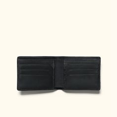 Limited Edition Luxury Bifold Wallet In Collaboration with Jack Andrews Vintage Leather Luxury Brand We are excited to bring in this collaboration with Jack Andrews—a new brand in the vintage leather luxury space. It brought us into our only and limited edition black full grain leather collection in the Buffalo Jackson product mix. Perfectly sophisticated, but not too stuffy. Details in all the right places. Take as your foundation the enduring classic style of a men’s bifold wallet. Now build o Black Leather Trifold Wallet For Everyday, Black Leather Rectangular Wallet, Black Bifold Wallet For Daily Use, Black Bifold Wallet With Interior Card Slots, Everyday Black Trifold Wallet With Smooth Grain, Black Leather Trifold Wallet For Business, Black Leather Wallet With Rfid Blocking, Classic Black Wallet For Everyday Use, Classic Black Wallets For Everyday