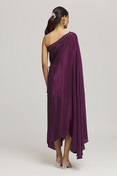 Purple one shoulder dress in a draped style and a solid flowy silhouette. - Aza Fashions Pre-draped Silk One Shoulder Dress For Cocktails, Pre-draped Silk One-shoulder Dress For Cocktails, Formal One Shoulder Dress With Draped Sleeves, Pre-draped One Shoulder Maxi Dress For Gala, Silk Draped One Shoulder Dress For Evening, Silk One-shoulder Pre-draped Dress, Formal Silk Draped One Shoulder Dress, Formal Silk One-shoulder Draped Dress, Evening Dress With Draped Sleeves And Asymmetrical Neckline