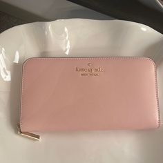 Brand New. Perfect Condition. Holds 12 Cards Plus Coin Zipper Slot Plus 3 More Sections. Kate Spade Compact Wallet For Everyday, Kate Spade Compact Everyday Wallet, Kate Spade Pink Wallet For Everyday Use, Kate Spade Everyday Bifold Bag, Trendy Kate Spade Wallets For Travel, Trendy Kate Spade Travel Wallets, Kate Spade Chic Wallet, Kate Spade Luxury Wallets, Luxury Kate Spade Wallet