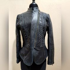 Reba Size Small, Lambskin Leather, Black, Studded, Peplum Jacket. Nwot Slant Full Zipper, Zipper Cuffs. Leopard Print Satin Lining. No Pockets. On Front Grommets, Studs, And Rope Decor. Extremely Soft. Measures 19 1/2" Across Armpit To Armpit Full Length 21 1/2" Sleeve 23" Fitted Winter Leather Jacket With Rivets, Fitted Leather Jacket With Rivets For Winter, Fitted Black Leather Jacket With Rivets, Leather Jacket With Rivets Long Sleeve, Leather Jacket With Rivets, Elegant Leather Biker Jacket For Night Out, Rope Decor, Digital Closet, Peplum Jacket