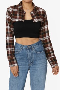 Step into the weekend with a casual yet stylish flair in our Cropped Plaid Button Down Shirt.This long sleeve flannel bolero features a classic checkered pattern, a point collared button-front, and a trendy shark bite cut.Perfect for fall, its lightweight woven fabric pairs effortlessly with high-waisted jeans or a solid midi skirt.Or, match with plaid matching crop top and high waisted baggy pants.Trendy Cropped Fit: A modern, raw edge shark bite curved hem perfect for layering with sleeveless Trendy Plaid Top For Fall, Trendy Flannel Long Sleeve Shirt, Fall Flannel Tops With Buttons, Flannel Tops With Buttons For Fall, Trendy Fall Flannel Shirt With Buttons, Trendy Collared Plaid Tops, Trendy Fall Flannel Shirt, Trendy Flannel Shirt For Fall, Trendy Collared Plaid Flannel Shirt