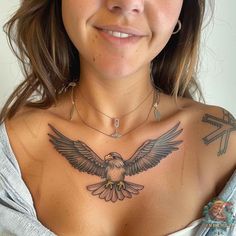 Elevate your style with this stunning eagle tattoo on the chest, perfect for women seeking a bold and feminine design. The detailed wings and fierce expression make it a standout piece. Visit inktat2.com for more amazing eagle tattoos. Eagle Tattoo Girl, Hawk Tattoo Feminine, Eagle Tattoo For Women, Eagle Neck Tattoo, Chest Tattoo Wings, Eagle Wing Tattoos, Fierce Expression, Hawk Tattoo, Stunning Tattoos