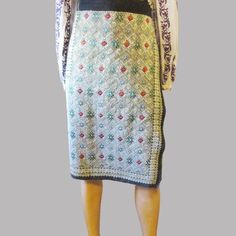 Romanian peasant costume : the traditional handmade skirt from Arges Muscel . This folk skirt is a rectangular entire piece which will be fixed around your waist with a needle.  Size: 124 cm x 64 cm or 48. 8 x 25. 2 inches Age: 50 - 80 years old.  Condition: good condition with normal  traces of the wear for its age . It is a gorgeous peasant wrap skirt . Traditional Multicolor Long Wrap Skirt, Folk Style Multicolor Embroidered Skirt, Folk Style Embroidered Multicolor Skirt, Traditional Green Embroidered Skirt, Traditional Multicolor Embroidered Skirt, Traditional Embroidered Skirt, Traditional Skirt With Woven Motifs, Traditional Multicolor Skirt With Traditional Patterns, Traditional Green Skirt