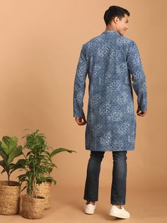 Vastramay Men's Blue Dot Printed Denim Kurta Elevate your ethnic style with this trendy blue dot printed denim kurta. It features a mandarin collar, long sleeves, and a button placket for a comfortable and stylish fit. Pair it with a white pyjama or fitted jeans for a complete look. Key Features Blue colored dot printed denim fabric Straight knee length kurta Mandarin collar Long sleeves with button cuffs Button placket closure Side slits Specifications Sleeve Length -Full Sleeves Shape - Straig Traditional Long Sleeve Kurta With Relaxed Fit, Casual Blue Kurta For Festive Occasions, Blue Casual Kurta For Festive Occasions, Casual Blue Festive Kurta, Blue Casual Festive Kurta, Blue Festive Casual Kurta, Spring Long Sleeve Kurta With Bandhani Print, Fitted Long Sleeve Kurta With Bandhani Print, Fitted Long Sleeve Bandhani Print Kurta