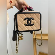 Chanel Filigree Small Vanity Caviar Beige/Black Very Good Condition. Only Has Wear On The Chain. Bag Only Price Is Firm. Bundle Deals Are Available If You Purchase More Than One Bag. Final Sale: No Return/Exchange/Refund ..$3000 Out Of Pm Small Vanity, The Chain, Chanel Bags, One Bag, Chain Bag, Black Cream, Chanel Bag, Designer Handbags, Final Sale