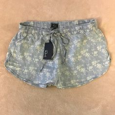 Rails Floral Dolhin Shorts Size L In Color Blue Made Of 100% Tencel Feature An Elastic Drawstring Waist. Machine Wash/Tumble Dry. New With Tag. Spring Casual Cotton Pajama Shorts, Casual Cotton Pajama Shorts For Spring, Beachy Cotton Pajama Shorts For Summer, Comfortable Beach Pajama Shorts For Spring, Comfortable Beach-style Pajama Shorts For Spring, Beachy Cotton Pajama Shorts For Loungewear, Blue Beachy Cotton Bottoms, Beachy Blue Cotton Bottoms, Beachy Blue Cotton Shorts