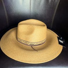 Frye Women’s Fern Canyon Wide Brim Fedora Straw Hat Color: Toast Size: Os One Size Fits Most Mixed Fabric Hatband With Faux Suede Cording Brass Metal Brand Logo Wide Brim Creates Instant Shade 100% Paper Straw Exclusive Of Trim Brim Measures Approx. 4.75" New With Tag Fern Canyon, Wide Brim Straw Hat, Wide Brim Fedora, Paper Straws, Hat Band, Brass Metal, Wide Brimmed, Straw Hat, Fern