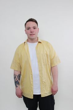 Hi! This is vintage from 90s vocation short sleeve shirt in yellow color This retro shirt made of COTTON. The model in the photo is 170 cm tall and is wearing a MEDIUM size top. ( 40 - size on the tag). But, be careful, this is a vintage size, it is better to check the measurements below in the product description. Sleeves - 28cm / 11.02inch; Width - 57cm / 22.44inch; Length - 75cm / 27.55inch. All measurements are taken seam to seam while lying flat. Sleeve measurement made from armpit to end o Yellow Collared Camp Shirt For Summer, Retro Short Sleeve Camp Shirt For Spring, Yellow Relaxed Fit Short Sleeve Shirt For Summer, Yellow Short Sleeve Camp Shirt For Summer, Yellow Short Sleeve Camp Shirt For The Beach, Yellow Casual Camp Shirt For Summer, Casual Yellow Camp Shirt For Summer, Yellow Summer Shirt With Camp Collar, Yellow Short Sleeve Camp Shirt For Beach