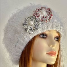 I Am Designer And Creator Of My “Hand Knits 2 Love” Brand. Add A Touch Of Romance To Your Winter Or Fall Ensemble With This Hand Knits 2 Love Slouch Hat Beanie Cap Beret Tam. The White Knit Hat Features Delicate Hand-Knit Flowers With Beads As Accents That Lend A Feminine Touch To Your Outfit. The One Size Fits All Hat Is Ultra Soft With Mohair Look. This Hand Knits 2 Love Hat Is A Handmade Piece, Crafted In The United States, And Perfect For Women Who Love Designer Chic. Its Romantic Floral The White Brimmed Crochet Hat, White Crochet Hat, One Size Fits All, White Yarn Beanie Cap, White Knitted Yarn Beanie, White Knitted Beanie Hat, White Knitted Hat, One Size Fits Most, White Knitted Cap Hat, White Knitted Hat One Size Fits Most, White Knitted Cap