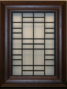 a brown frame with squares and lines on the inside, in front of a white background