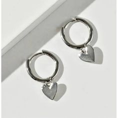 Heart Huggie Charm Earrings Approximately 0.8" Zinc, Brass, 18k Gold And White Gold Dipped. Lead Compliant, Nickle Free. Heart-shaped White Gold Hoop Earrings For Valentine's Day, White Gold Heart Hoop Earrings For Valentine's Day, White Gold Heart-shaped Hoop Earrings For Valentine's Day, Valentine's Day Heart Shaped White Gold Hoop Earrings, Sterling Silver Heart-shaped Huggie Earrings, Sterling Silver Heart Shaped Huggie Earrings, Silver Huggie Earrings For Valentine's Day, Heart-shaped White Gold Hoop Earrings Gift, Silver Double Heart Cute Earrings