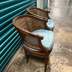 Pair of vintage barrels chairs. These chairs have caned seats, sides and backs with a fitted cushion. Cushions are stained but ready for reupholstery! Carved details on arms and bottom frame. In overall great vintage condition. No breaks to caning. Property of the famous quick-witted Palm Beach socialite Suebelle " The instaqueen of Palm Beach" Robbins personal collection. Used in her Palm Beach penthouse. She bought them at an auction in Newport. Vintage Cane Chairs With Unattached Cane Arms And Fabric Back And Cushion With Ornate Wood On Top, Wedding Lounge Area Indoor Vintage Furniture, Vintage Cane Chair Makeover, Oxenwood Furniture, Antique Wicker Furniture, Cane Barrel Chair, Cane Chair Makeover, Reupholstered Chairs, 70s Chairs