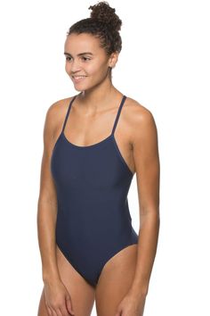 The Perry is a non-adjustable swim onesie that features contrasting stitching and binding for a crisp, athletic look. The contemporary design includes two over-the-shoulder straps that criss-cross along the back and transition into a cut-out detail along the ribcage. Features medium bum coverage, tagless care instructions, and privacy lining to keep even the lighter-colored suits from revealing too much.Super durable with reinforced stitchingOutside Fabric: 100% PolyesterInside Lining: 100% Poly Nylon Straps Bodysuit For Swimming, Sports Bodysuit With Lined T-back, Sports Bodysuit With Lined Body And T-back, Solid Nylon Strappy Swimwear, Lined T-back Bodysuit For Sports, Solid Color Strappy Nylon Swimwear, Solid Strappy Nylon Swimwear, Sports Nylon Strappy Swimwear, Solid Color Strappy Back Bodysuit For Beachwear