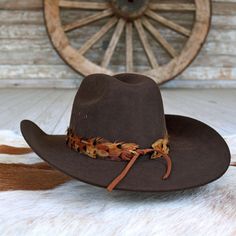 The Stellar (short) is a smaller version of our best selling hat band. Specially designed for small sized hats (6 7/8 and under) and kids hats.    100% Feather  Length: approx. 53cm (not including leather ties)  Width: 2cm  Crest dimensions: 4"w X 3"h Feather Hat Band, Western Men, Cowboy Hat Bands, Silver Hats, Beaded Hat Bands, Kids Belt, Beaded Hat, Feather Hat, Outdoor Hats