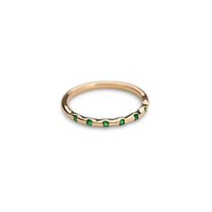 Fall in love with our 14k Solid Gold and Emerald Stackable Ring. Classy and timeless. The perfect gift for a special someone or simply as a reminder to love yourself! Featuring 7 Genuine ethically sourced Emeralds Material: 14k Gold and Genuine Emeralds Please note, our current processing time for this ring is 1 - 2 weeks. Classic Stackable Emerald Ring With Round Band, Luxury Yellow Gold Stackable Emerald Ring, Luxury Stackable Yellow Gold Emerald Ring, Classic Stackable Round Cut Emerald Ring, Formal Gemstone Stackable Rings With Round Band, Classic Stackable Emerald Ring With Round Cut, 14k Gold Green Half Eternity Jewelry, Yellow Gold Emerald Jewelry With Round Band, Green 14k Gold Half Eternity Jewelry