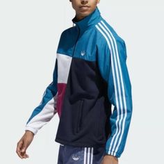 Genuine Adidas Originals Asymm Full Zip Track Jacket Colour: Active Teal / Berry Brand New With Tags 100% Authentic - Free Delivery Panelled In A Palette Of Blue, Pink And White, This Adidas Track Top Is A Pure Cotton Piece That Proves That Opposites Really Do Attract. Made Up Of Contrasting Patterns And Fabrics To Create A Striking Look, The Zipped Piece Is Completed With A Pair Of Practical Front Pockets. 100% Cotton Recycled Polyester Panels Stand Collar Zip Closure Blue Adidas Sporty Windbreaker, Adidas Blue Sporty Windbreaker, Sporty Blue Adidas Windbreaker, Casual Blue Adidas Outerwear, Navy Adidas Track Jacket For Streetwear, Adidas Navy Track Jacket For Streetwear, Blue Adidas Windbreaker For Sports, Adidas Blue Track Jacket For Streetwear, Blue Adidas Sports Windbreaker