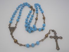 Offered is a wonderful pair of Victorian rosary beads circa 1890's. The pair is set in sterling silver with smaller size glass beads. From end-to-end, the rosary measures 13 inches making it a smaller pair - perfect for children. The rosary set is in excellent condition and will make a wonderful heirloom tradition! Please note that we only sell original antiques. We do not alter, replace, repair, or repurpose; and we do not sell reproductions. Buy with confidence that you are receiving the real Wedding Communion, Heirloom Traditions, Pocket Watch Chain, Porcelain Dinnerware, Victorian Gold, Bead Set, Silver Glass, Rosary Beads, Chain Extenders