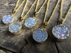 "These adorable angel aura crystal druzy necklaces have a truly spectacular sparkle! Each real druzy charm pendant is dipped in your choice of gold or silver plating and hung from your choice of length: 18\" for a standard length, or 20\" for extra length (Model is wearing 18\"). You may choose your chain in gold plated, real 14K Gold filled, silver plated, or real .925 Sterling silver. You may also choose your chain style: bead, link, or cable. I highly recommend the real 14K Gold filled and St Sparkling Gold Crystal Necklace As Gift, Gold Sparkling Crystal Necklace As Gift, Sparkling Gold Crystal Necklace Gift, Sparkling Gold Crystal Necklace For Gift, Adjustable Sparkling Necklace As A Gift, Sparkling Adjustable Necklace For Gift, Adjustable Sparkling Necklace For Gift, Angel Aura Quartz Necklaces, Raw Stone Necklace