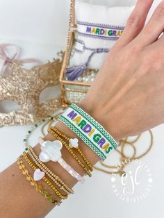 Mardi Gras Embroidered Bracelet / Tassel Mardi Gras Bracelet / Fat Tuesday / Mardi Gras / Friendship Statement Bracelet Great to add to your Bracelet Stack for Mardi Gras Mardi Gras Bracelets come as pictured  Choose from: #15 White/Purple or #53 White/Emerald Green **LISTING IS FOR (1) BRACELET** **Colors/shades of bracelets may vary depending on availability** Designed and Curate by EstelleJoyLynn, LLC Adjustable Embroidered Multicolor Beaded Bracelets, Adjustable Multicolor Embroidered Beaded Bracelet, Adjustable Embroidered Bangle Bracelet, Gold Embroidered Bangle Bracelet, White Embroidered Bracelets For Friendship, White Embroidered Bohemian Bracelet, White Bohemian Embroidered Bracelet, Bohemian White Embroidered Bracelet, White Embroidered Beaded Bracelets As Gift