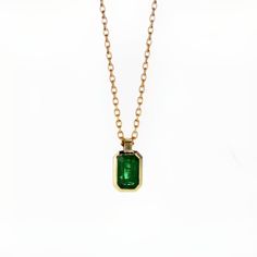 14k Yellow Gold Radiant shape Emerald (may birthstone) Gold Bezel Setting Pendant Necklaces. Main Stone: Radiant Shape Natural Emerald In Weight Of 0.45 Ct Color - Green Chain length 45cm (17.7inch) with a stop at 42cm (16.5inch) for shorter option Alena Diamonds & Jewelry was created from our passion for custom-made jewelry, and for fulfilling our customer's fantasies. We are Alex and Maayan, we created Alena after years of experience we received by working in the jewelry industry, Starting from diamond gemology in the Israeli diamond exchange, and then making fine crafted gold jewelry with our beautiful diamonds that we choose one by one very carefully and by our long experience of diamond gemology. Alex is a certified Diamond gemologist by C.G.S gemology known school in the diamond exch Yellow Gold Necklace With Emerald Cut Bezel Setting, Yellow Gold Emerald-cut Necklace With Bezel Setting, Yellow Gold Emerald Cut Necklace With Bezel Setting, Formal Emerald Necklace With Bezel Setting, 14k Gold Birthstone Necklace With Bezel Setting, Classic Emerald Necklaces With Bezel Setting, Fine Jewelry 14k Gold Birthstone Necklace With Bezel Setting, Classic Emerald Necklace As Birthstone In Yellow Gold, Gold Emerald-cut Jewelry With Bezel Setting