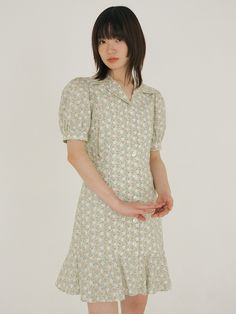 Editor's NotesThe FJD Flower Square Collar Button Dress is a tailored collar dress made from cotton 60's material, designed with incisions on the front and back panels, and has a shirring only on the front bust to create volume. It also creates a lovely mood with puff sleeves with shirring, frills on the hem, and tailored collar details. - Tailored collar - Cotton 60's material- Incisions on the front and back panels- Shirring only on the front bust- Puff sleeves with shirring & frills on the hem Measurements(in.)Size: Size(S/M) - Total Length: 34.44in. / 34.84in.- Shoulder: 13.97in. / 14.56in.- Chest: 17.32in. / 18.11in.- Waist: 14.56in. / 15.35in.- Hip: 17.32in. / 18.3in.- Hem: 38.77in. / 39.56in.- Sleeve: 10.62in. / 11.02in. Model Info: Height 5' 41, Wearing Fitted Dress With Buttons And Collared Neckline, Fitted Floral Print Shirt Dress With Short Sleeves, Fitted Short Sleeve Floral Print Shirt Dress, Fitted Knee-length Floral Print Shirt Dress, Fitted Floral Print Short Sleeve Shirt Dress, Fitted Cotton Shirt Dress With Floral Print, Spring Mini Dress With Collared Neckline And Fitted Design, Spring Mini Dress With Fitted Collared Neckline, Fitted Collared Dress For Garden Party