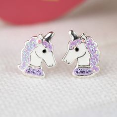 Bright children's eyes are guaranteed with these beautiful stud earrings with a unicorn motif! The children's earrings are made of 925 sterling silver and enamel. ❤ DETAILS - Material: 925 sterling silver, enamel, crystal - Color: silver, purple - Size: 8x11 mm - 1 pair (including 2 ear nuts) The earrings are delivered in a pretty jewelry box. ❤ More stud earrings in 925 sterling silver: https://www.etsy.com/de/shop/GluecksbringerinShop?ref=condensed_trust_header_title_sold&section_id=30254870 ❤ Crystal Children, Beautiful Stud Earrings, Pretty Jewelry, A Unicorn, Girls Jewelry, Kids Jewelry, Fun Earrings, Silver Enamel, Pretty Jewellery