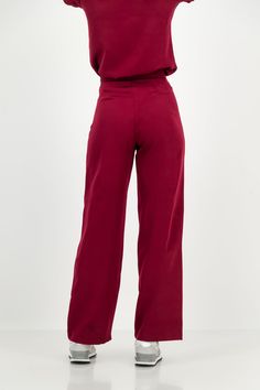 Patent Pending These high-waisted, wide-leg trousers redefine versatility, seamlessly transitioning from scrubs to office wear and smart casual effortlessly. The minimalist and elegant design adds a touch of sophistication to any ensemble. The high-waisted fit and wide-leg silhouette create a flattering and timeless look. These trousers are not just scrubs; they're a wardrobe staple. Pair them with your favorite scrub top for a polished medical professional look, or dress them up with a blouse f Elegant Burgundy High-waisted Wide Leg Pants, Burgundy Stretch Pants For Workwear, Solid Color Wide Leg Pantsuit With Pockets, Solid Wide Leg Pantsuit With Pockets, Wide-leg Office Pantsuit, Solid Wide-leg Pantsuit For Office, Solid Color Wide-leg Pantsuit For Office, Solid Wide Leg Pantsuit For Office, Office Wide Leg Solid Pantsuit